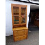 Pine glazed bookcase with drawers to base H204cm W90cm D52cm approx