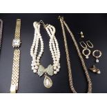 Jewellery lot to include a 925 silver chain, bracelet and hooped earings, a ladies Rotary watch a/