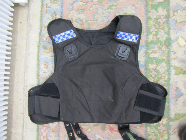 Ex police body armour size short/medium  These vests were bought from an established surplus dealers