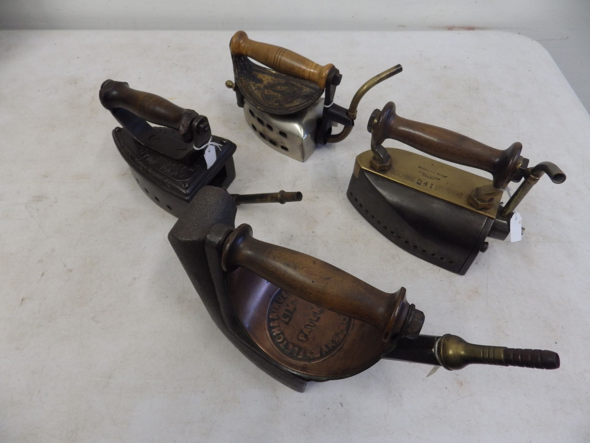 4 assorted gas irons to incl R G Thwaites The Premier no 2436? Hyde Park, The Monarch of all, T