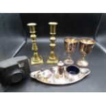 Metal cruet set, brass candlesticks, goblets and a vintage Kodak camera