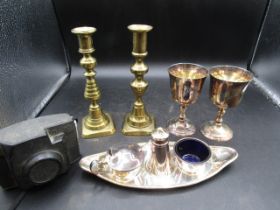 Metal cruet set, brass candlesticks, goblets and a vintage Kodak camera