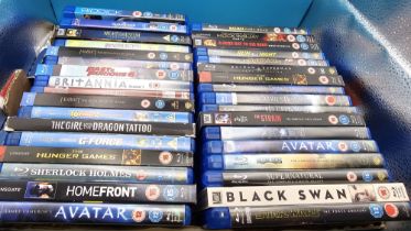 Box of Blu Ray DVD's including multi disc sets and digital downloads