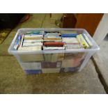 Large tub full of books, mostly novels