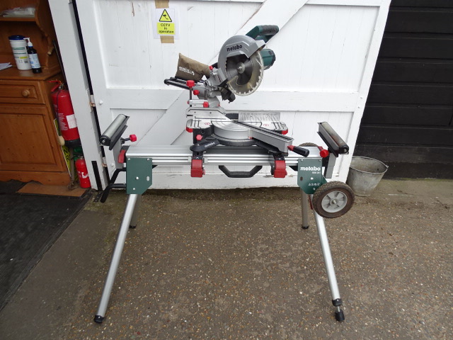 Metabo KGS 254 M mitre saw with Metabo KSU 251 folding mitre saw stand with wheels, all in good