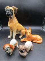 4 dog figurines