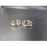 2, 9ct gold rings smallest size J, largest with a small diamond size N, 3.62g total weight.