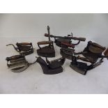 8 assorted gas irons to incl 2 x turn over gas irons, Brittania patent 238701/24, Izot? patent