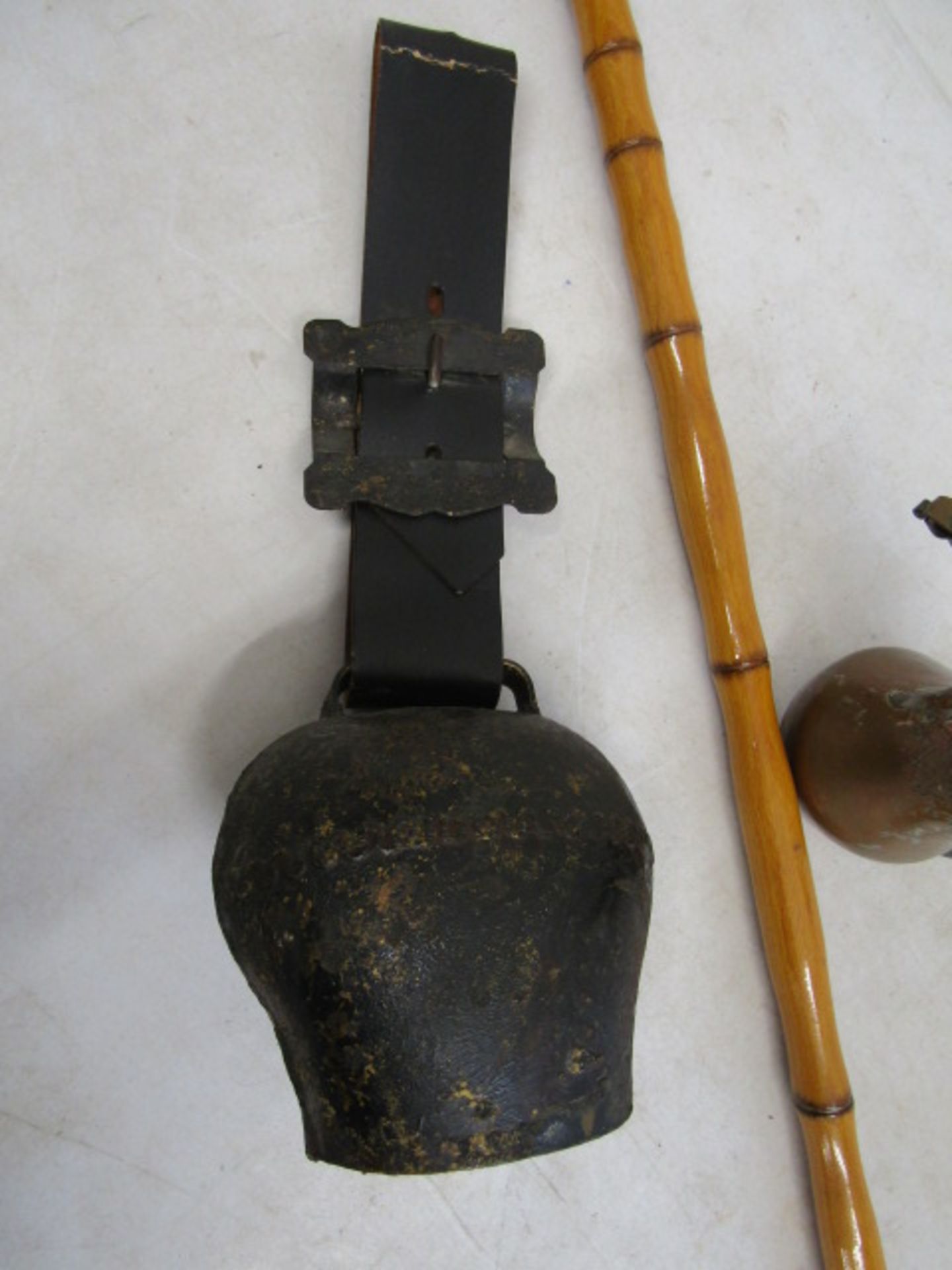 An Islamic teapot, walking cane and cow bell - Image 3 of 5