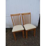 Pair of upholstered dining chairs