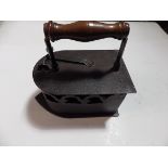 19th century French charcoal box iron with pivot latch and wooden handle