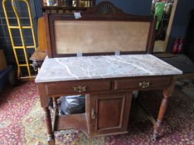 A washstand with marble top back has no tiles, one caster missing