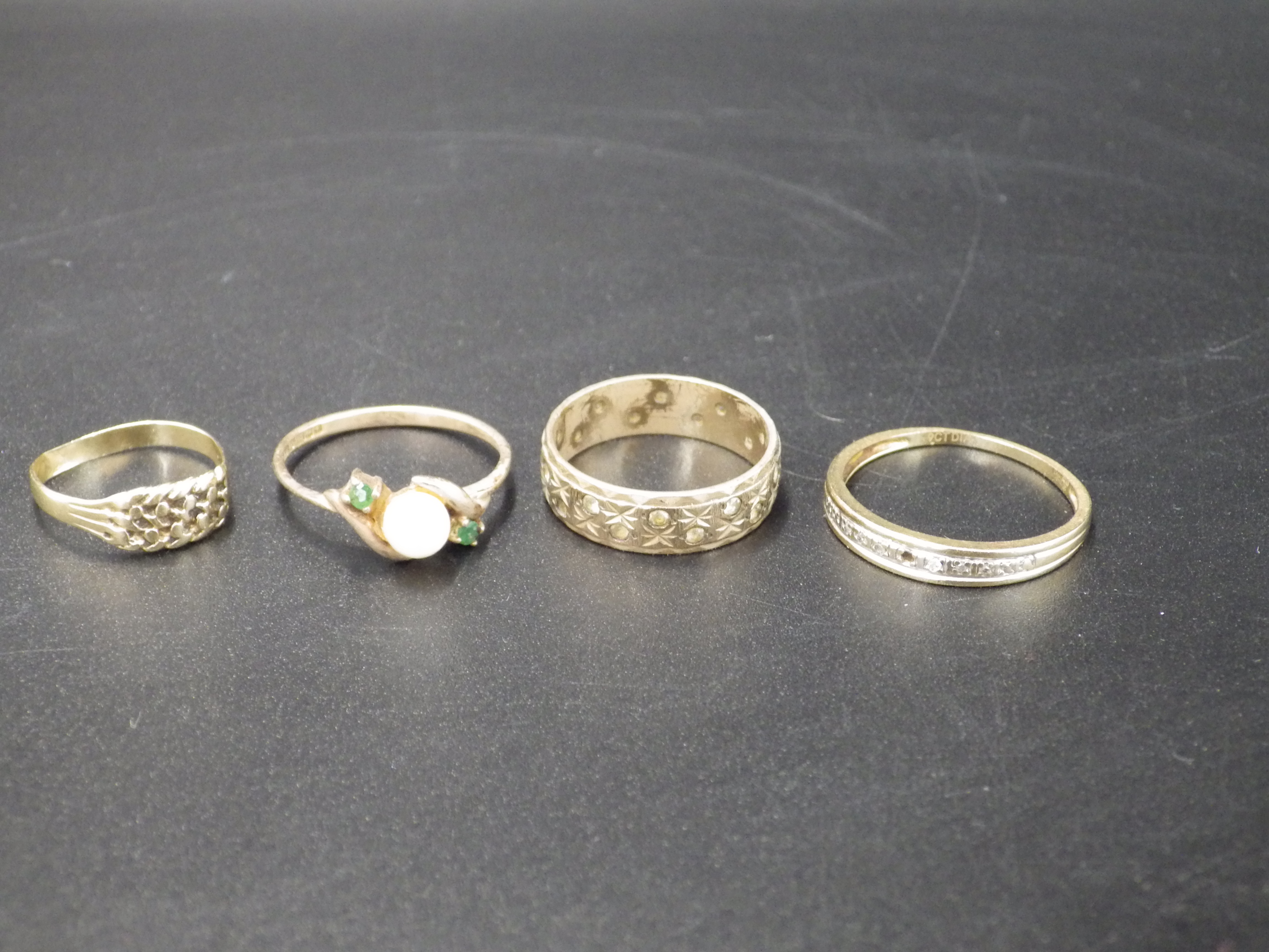 4, 9ct gold rings - smallest size H, band ring with CZ (one stone missing) size O, 'pearl' ring size