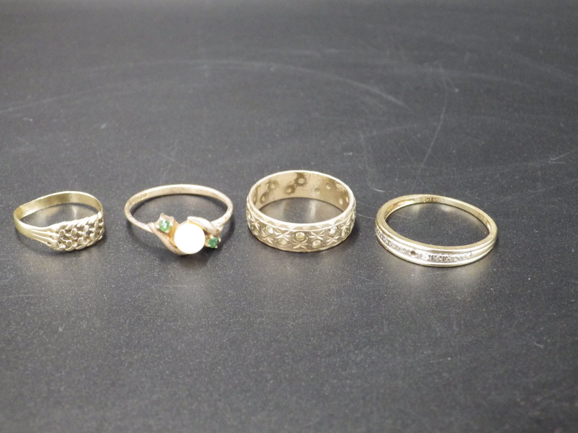 4, 9ct gold rings - smallest size H, band ring with CZ (one stone missing) size O, 'pearl' ring size