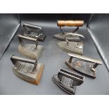 7 assorted flat/sad irons to include Jardinier no.4, Helvetia, Gendarme, Hardings patent safety grip