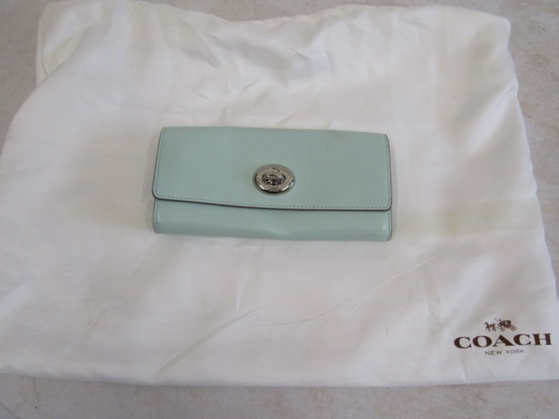 Coach light blue clutch bag/purse with dust bag