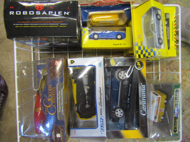 Boxed die cast cars and Robosapian toy