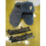 A Russian style hat and fen skates