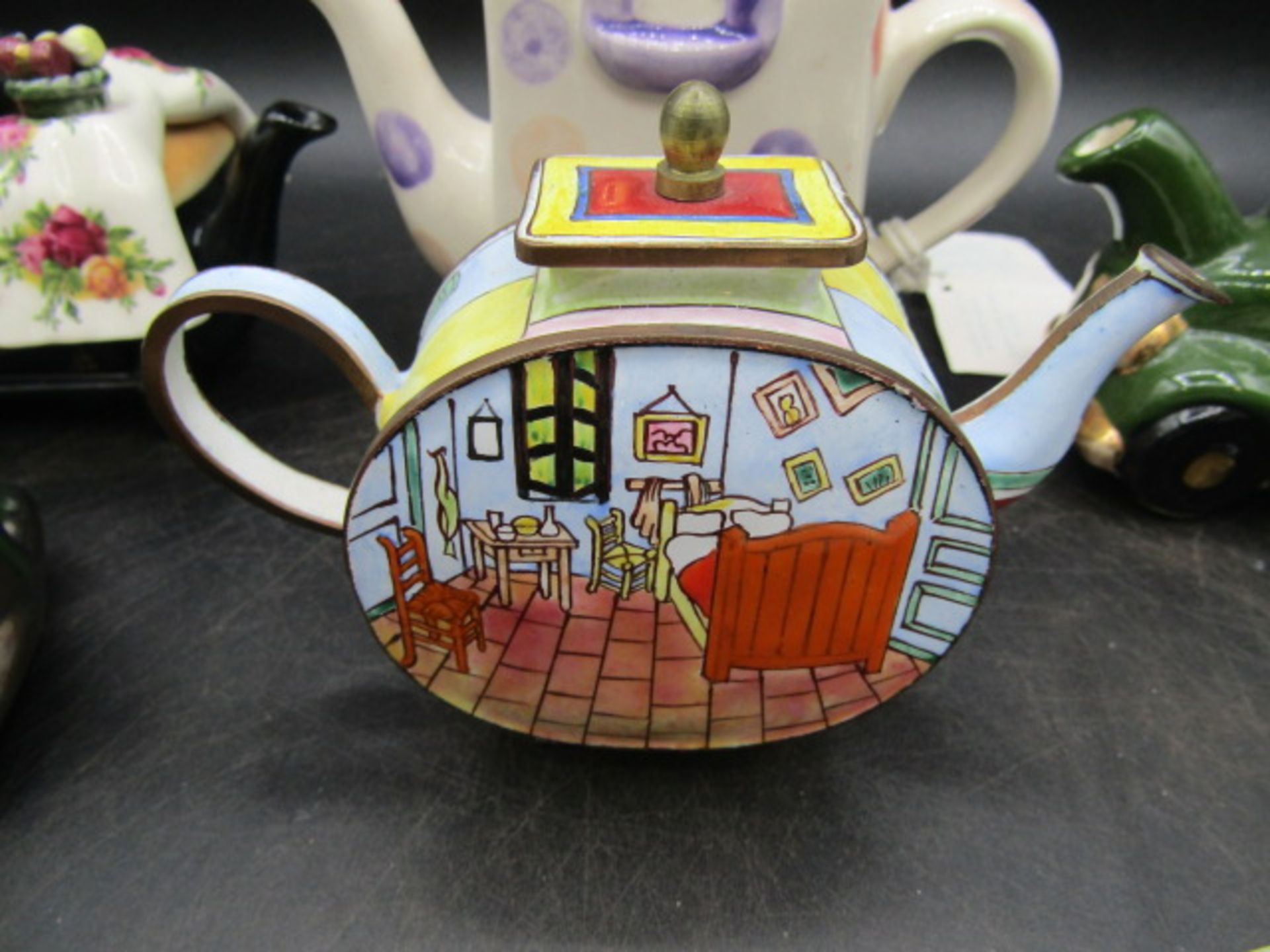 A collection of novelty teapots inc one enamelled and German priest cruet's - Image 6 of 7