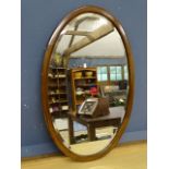 Oval inlaid wall mirror