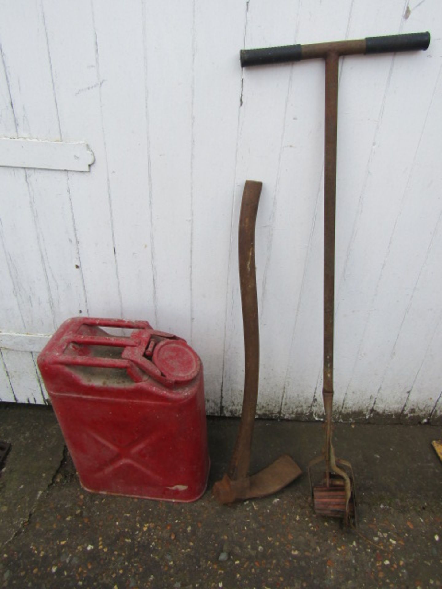 metal jerry can, lawn edger and axe