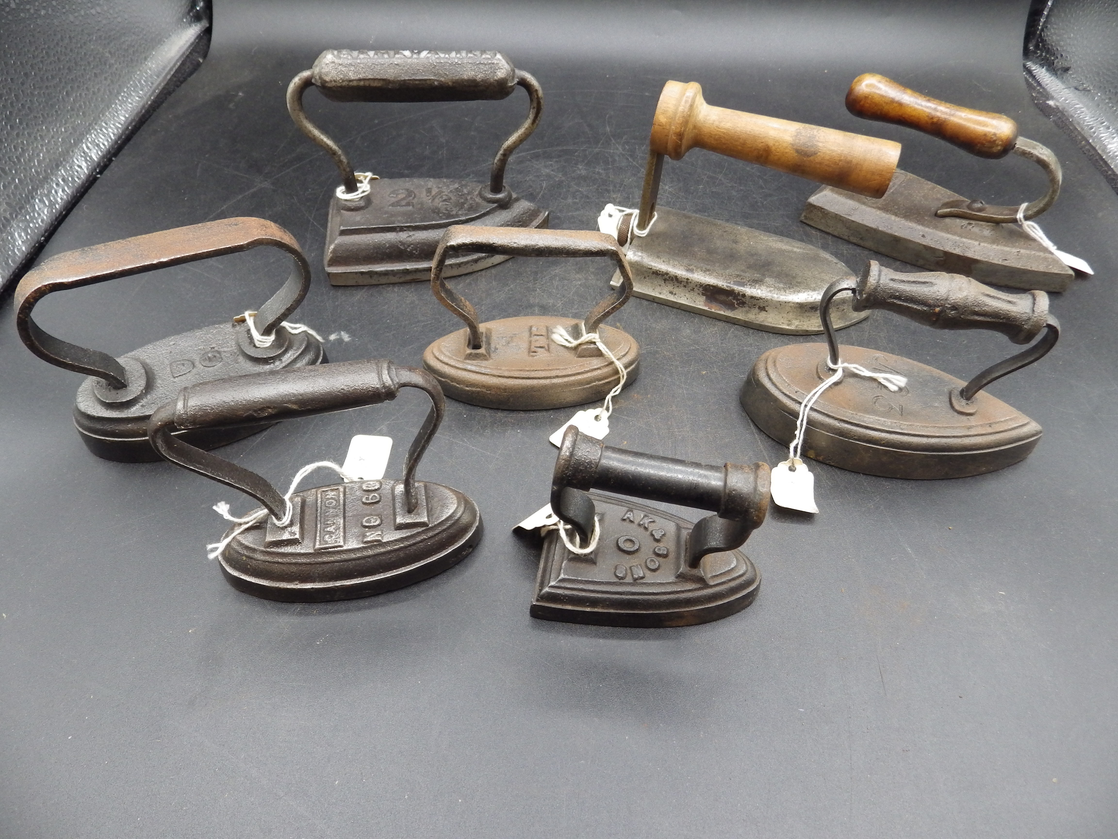 8 assorted minature irons to include hatters irons includes Geneva, TH, GC, Cannon, AK & Sons etc - Image 2 of 2