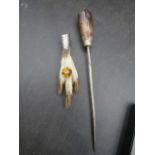 A silver grouse foot and a hat pin white metal collar