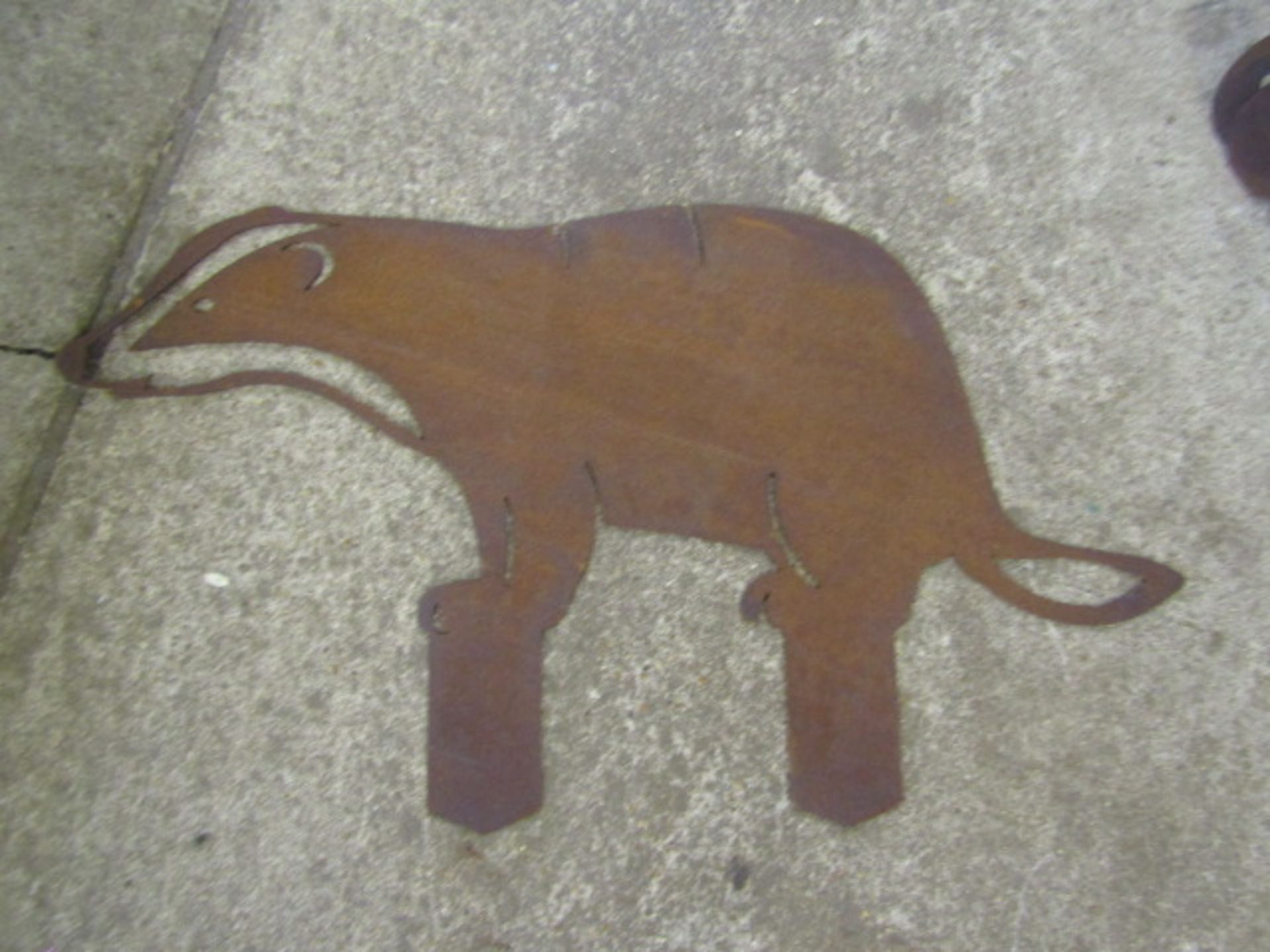 Rustic metal garden plaque badger