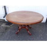 Mahogany oval tilt top breakfast table with birdcage