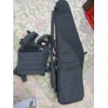Sniper rifle carry bag with accessory pockets and shoulder straps  plus a tactical vest