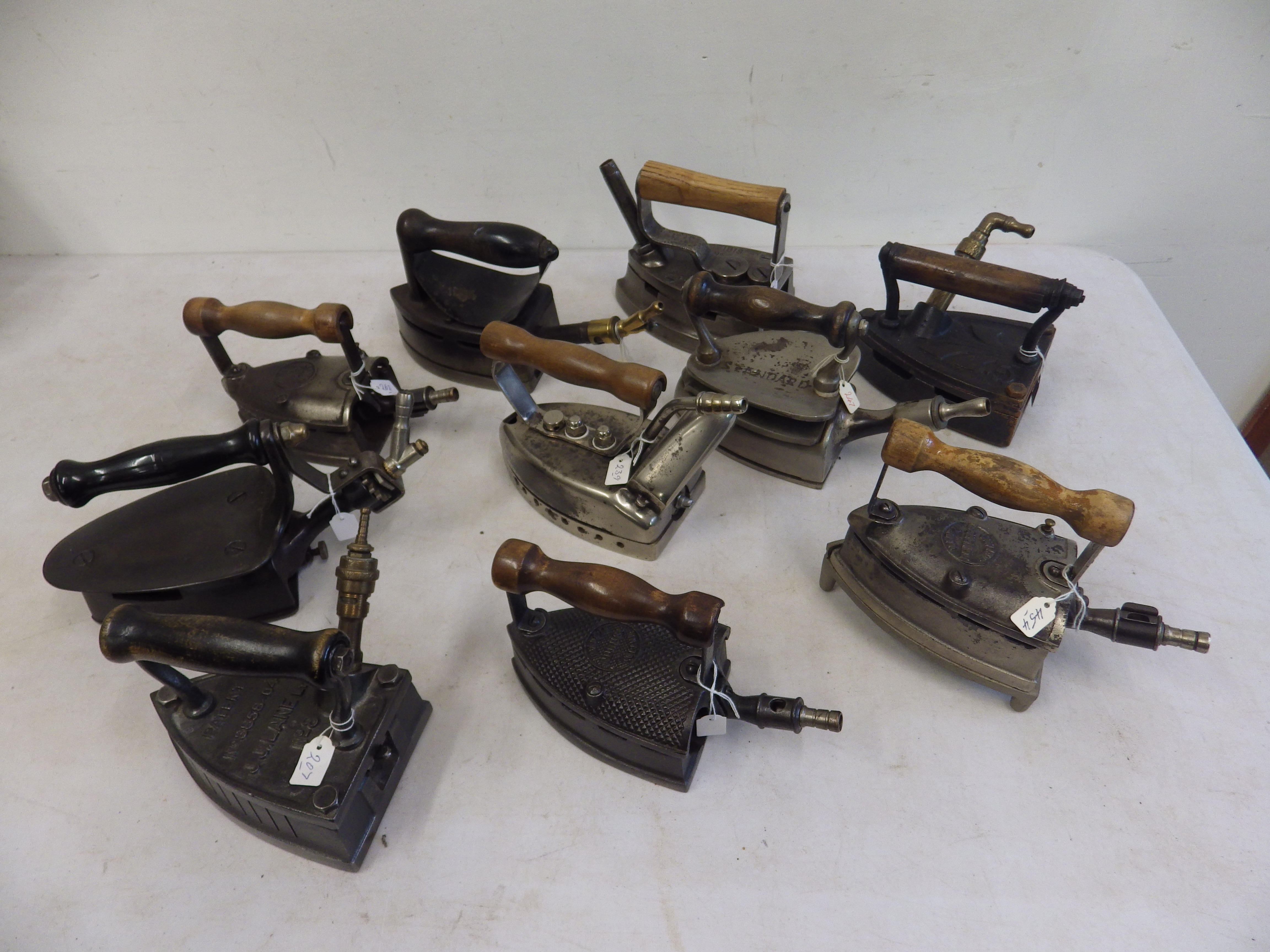 10 assorted gas irons to include Nurusl, Bow Bros, Thomas Bradford, Standard, Brostrom, Ibis