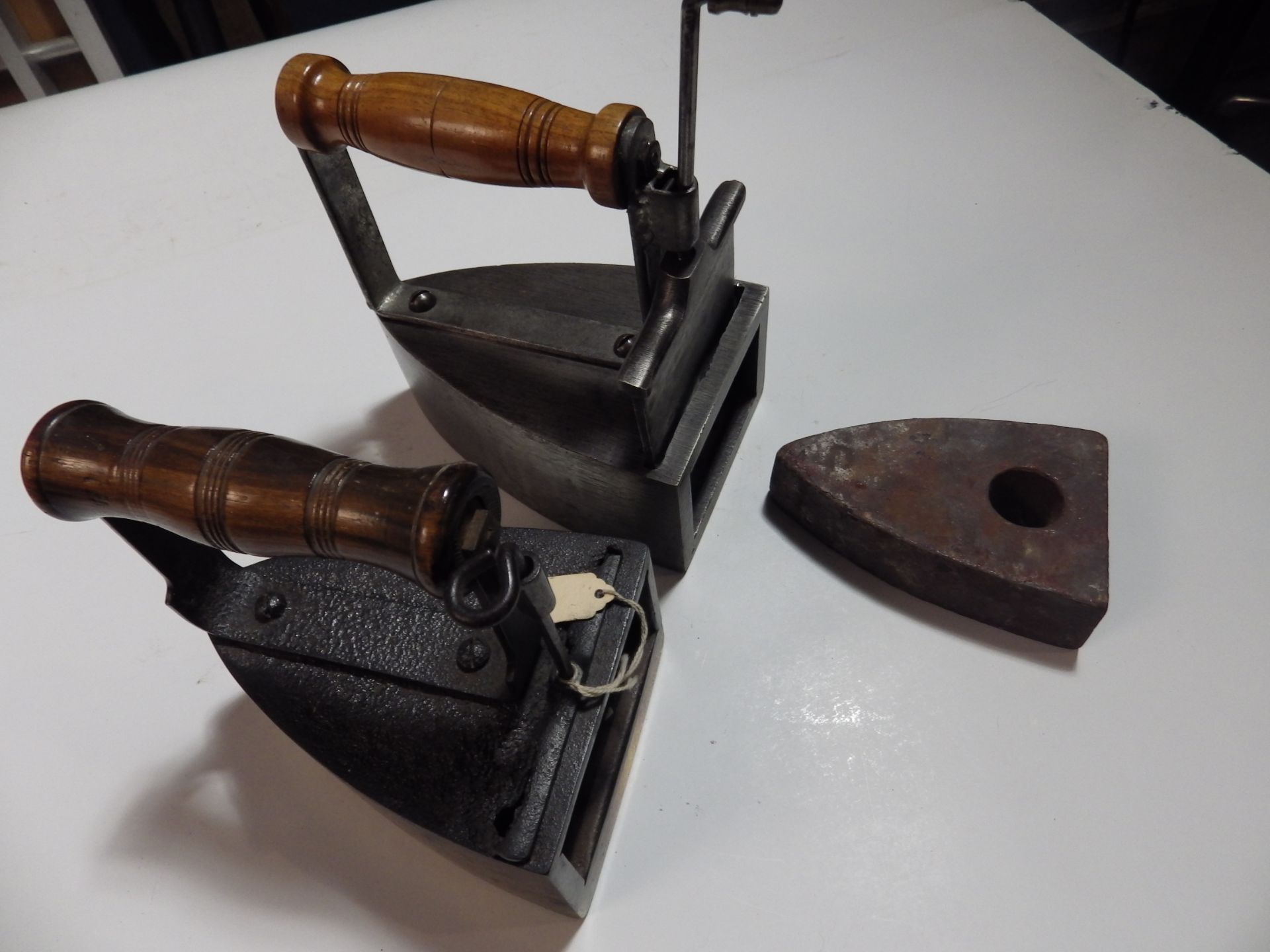 2 box irons with wooden handles one with slug the other with brass base - Image 2 of 2