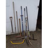 Garden tools to include hoes and fork etc