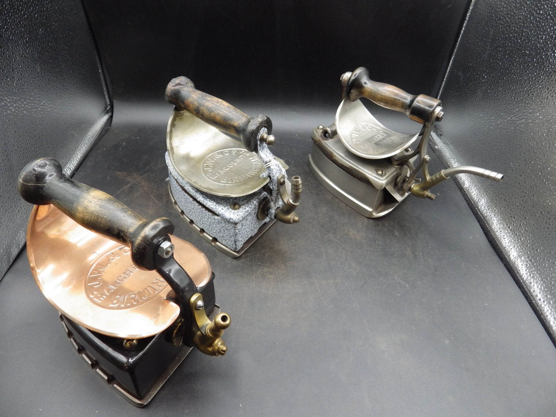 3 John Wright & Co Ltd Birmingham gas irons to incl Marguerite black enamel model with copper heat