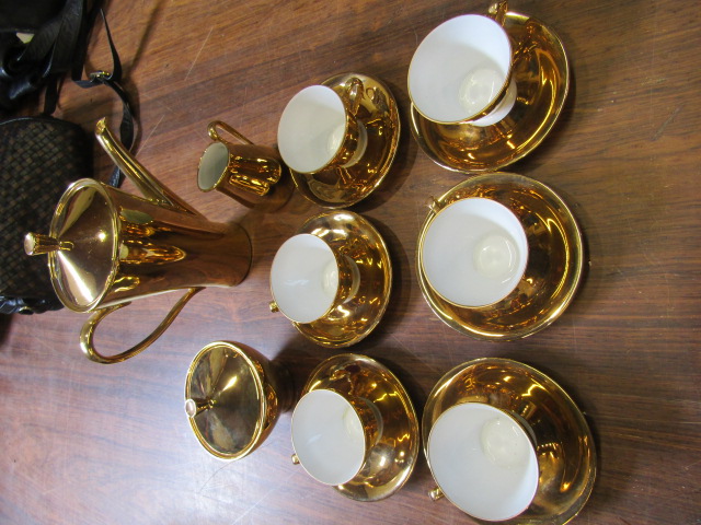 A German gold coloured coffee set for 6