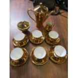 A German gold coloured coffee set for 6