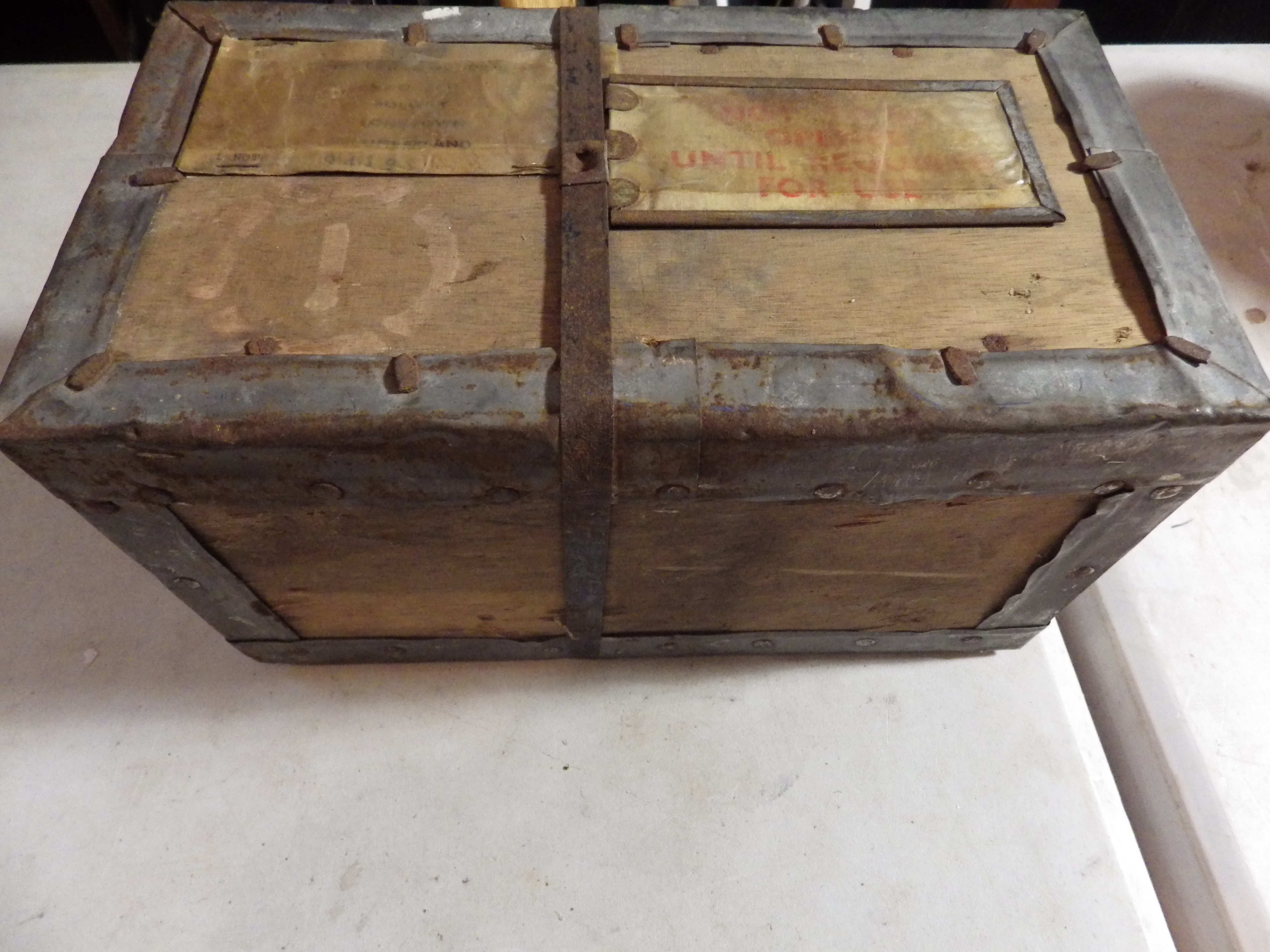 Military G S Co Ltd sealed wood box with metal banding label states containing 5 sad irons (