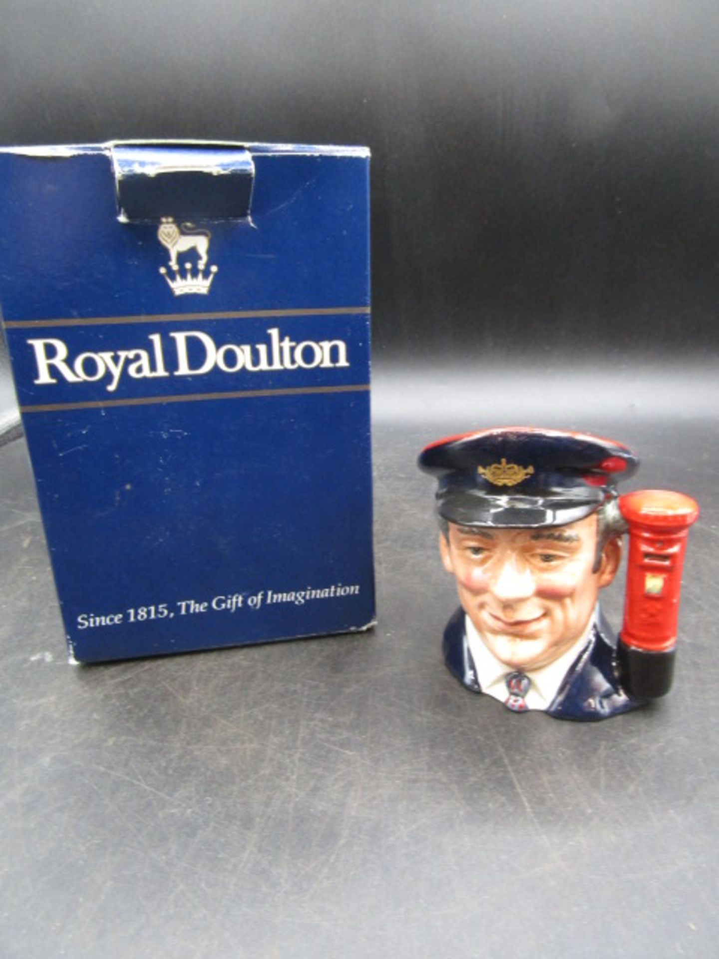 Royal Doulton The Postman toby jug