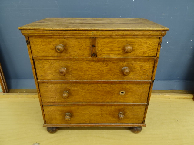 Miniature oak 2 short over 3 long chest of drawers (missing one knob) H44cm W42cm D29cm approx