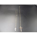 2, 9ct gold chains with cross pendants one chain broken. 4.44g total weight.