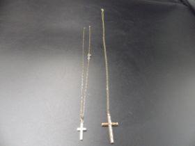 2, 9ct gold chains with cross pendants one chain broken. 4.44g total weight.
