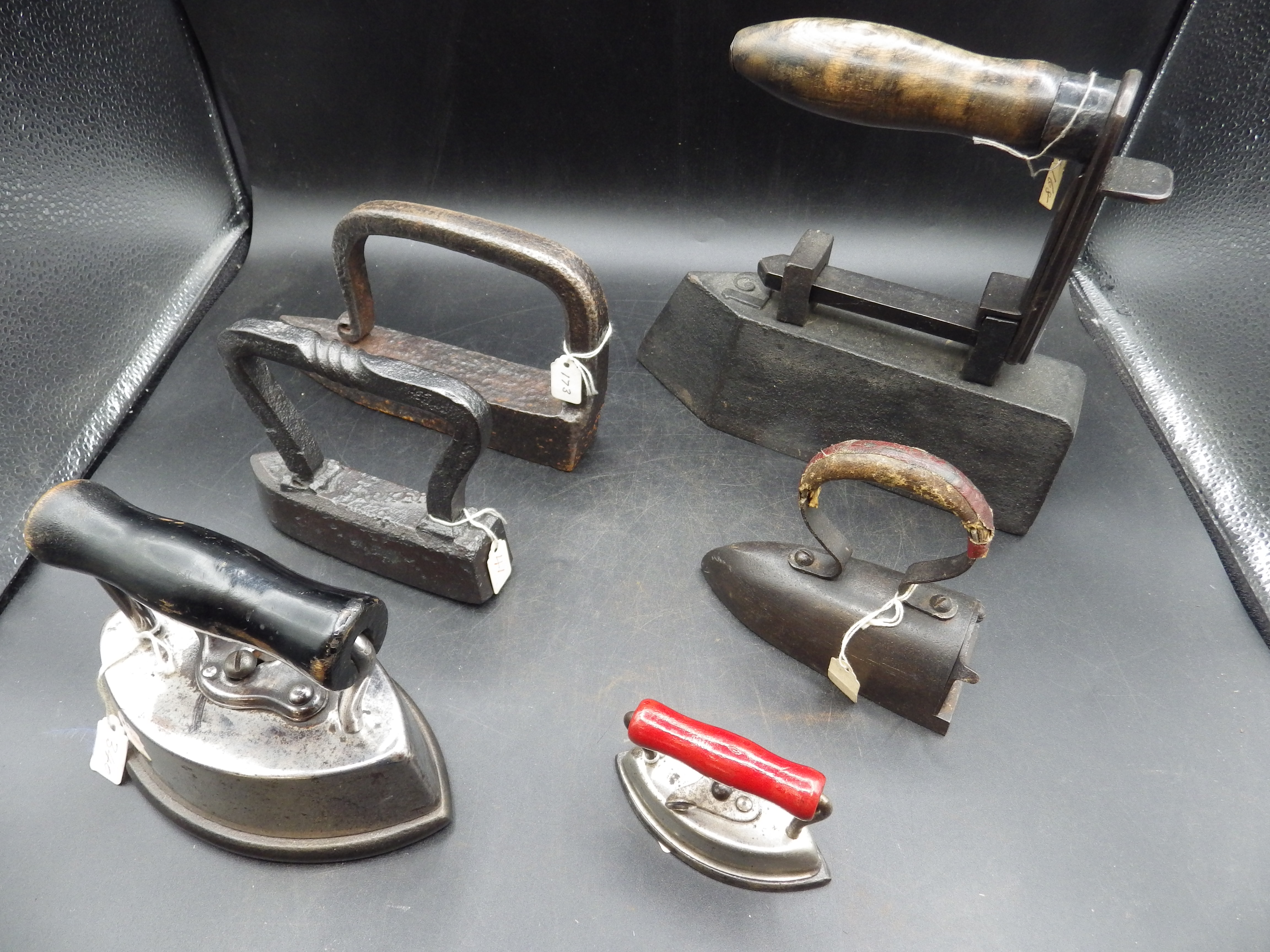 6 assorted irons to include tailor goose irons incl one old hand forged iron, box iron with slug and