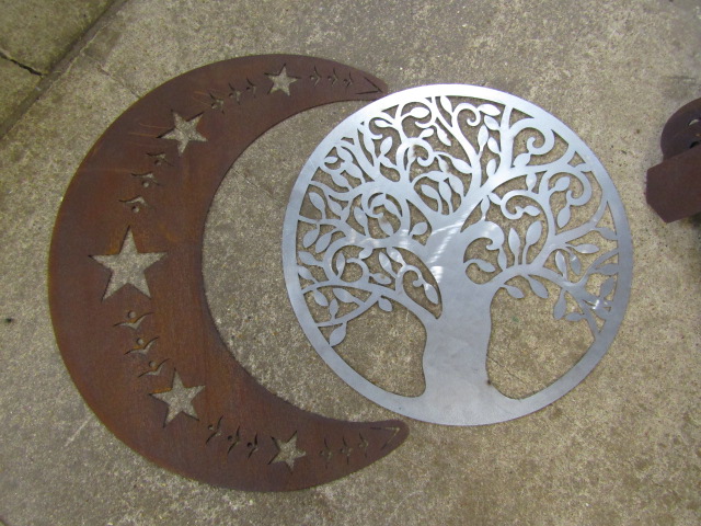 Rustic metal crescent moon and a steel tree plaque