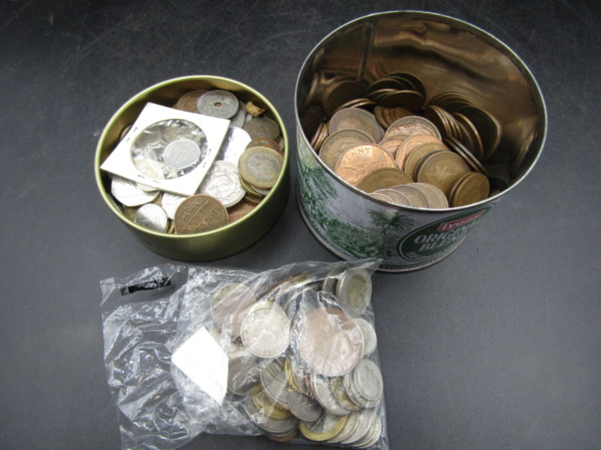 Old pennies and a tin mixed coinage