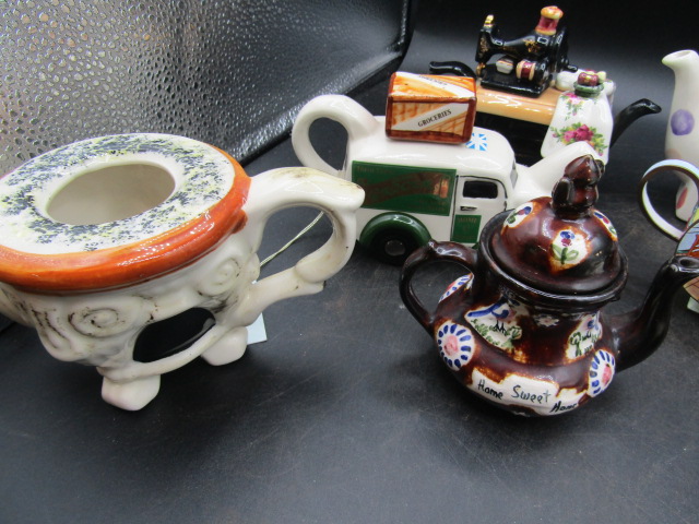 A collection of novelty teapots inc one enamelled and German priest cruet's - Image 3 of 7