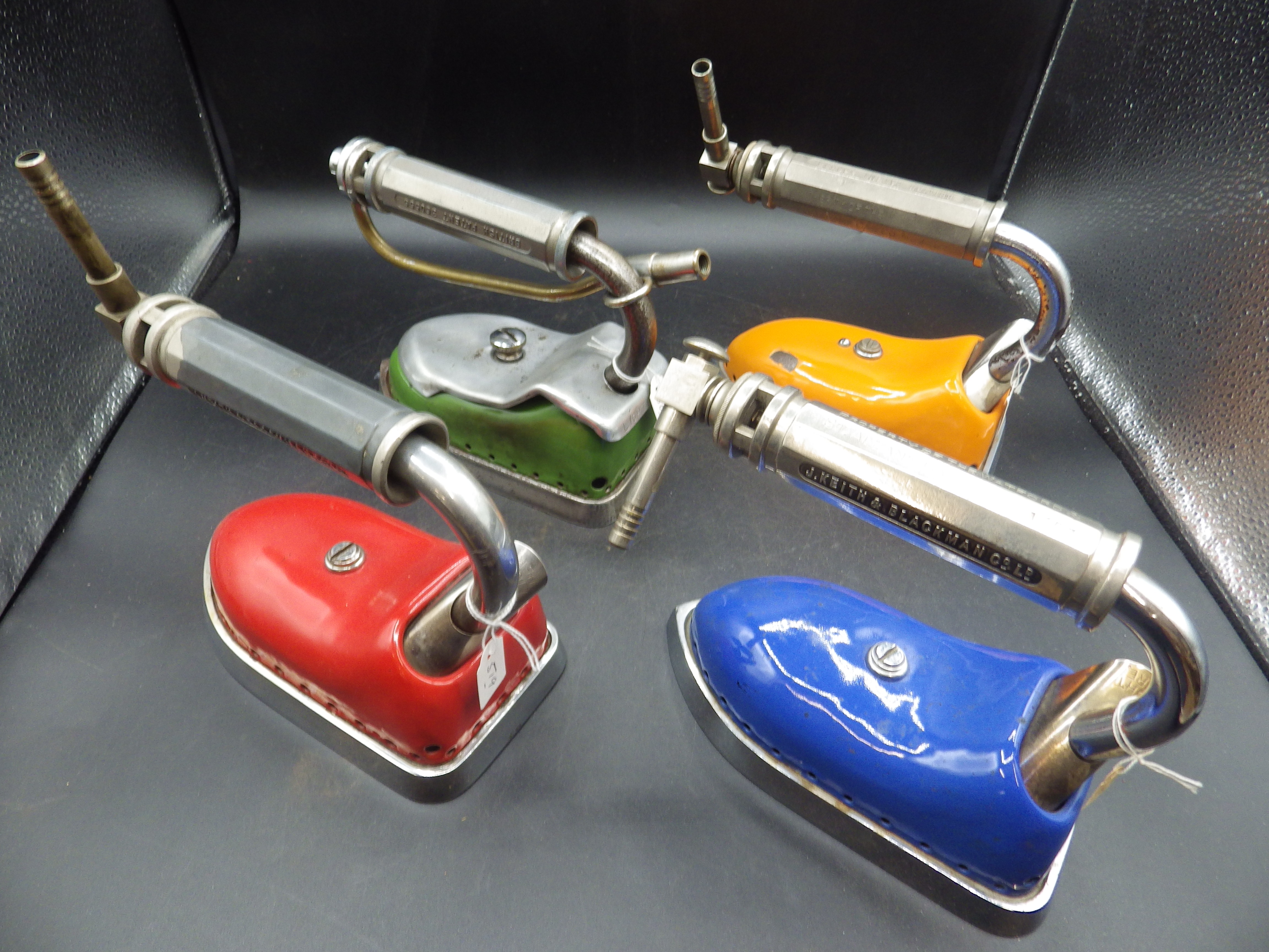 4 J Keith & Blackman Co Ltd patent 360555 coloured enamel irons in red, green, blue and orange