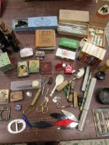 Collection of vintage and antique sewing implements