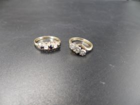 2, 9ct rings smallest size 'I' with 3 diamonds and one size 'M' with Cubic Zirconia and sapphire.