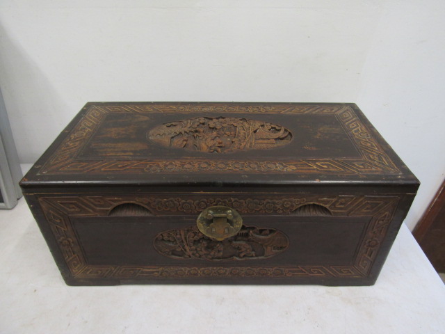a carved chest 62x32x26cmH