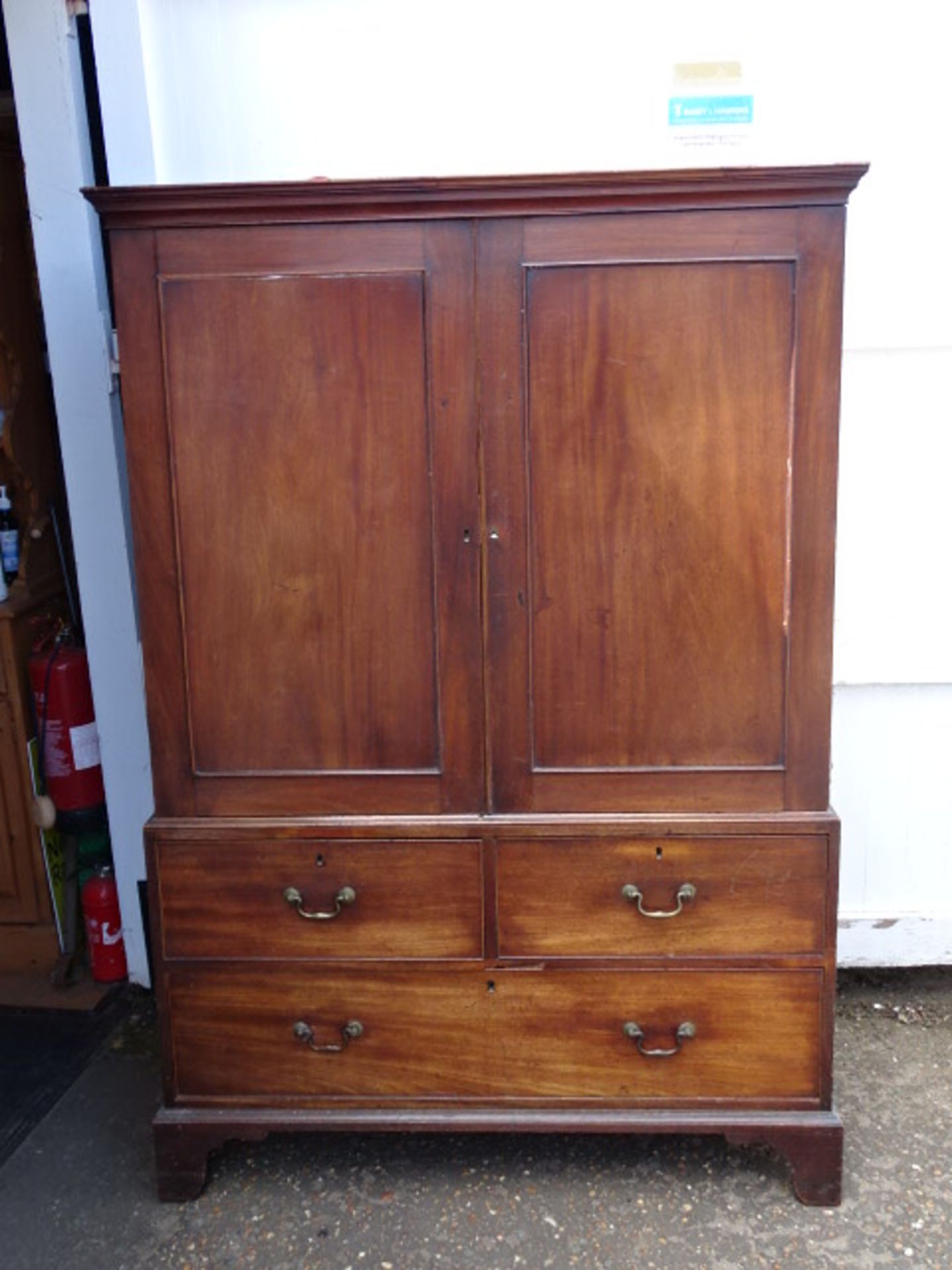 Mahogany linen press/cupboard with brass handles (needs some restoration, beading missing around